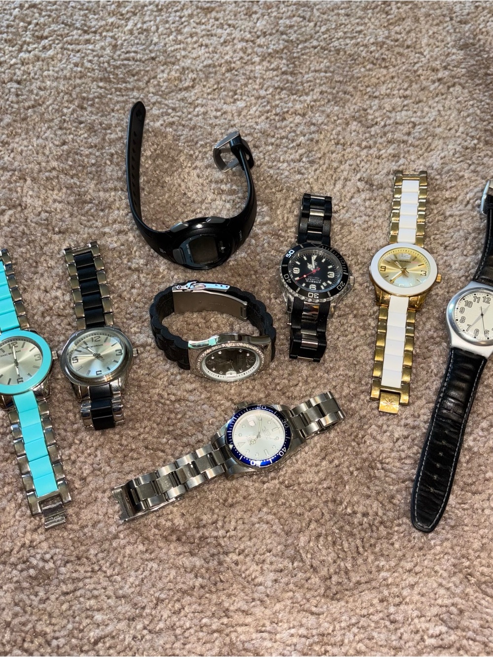 Variety of Men's Watch Collection with Mixed Bands